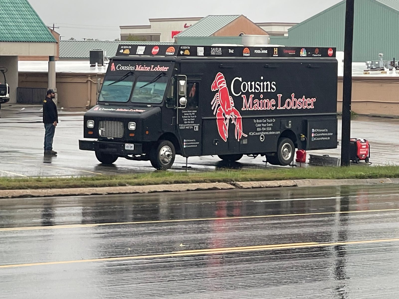 A Cousins Maine Lobster truck using its full side as a clear, recognizable billboard
